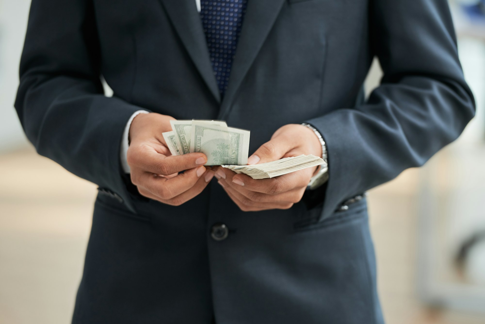 Businessman with dollar currencies